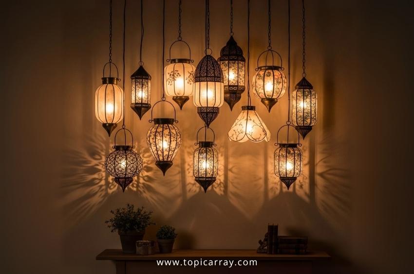 A DIY hanging lantern display featuring a collection of various-sized and intricately patterned metal and glass lanterns, casting cozy, ambient lighting on a wall.
